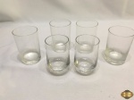 Lote de 6 copos de aperitivo em vidro, sendo 4 com 8cm de altura e 2 com 7,5cm de altura.