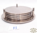 Jogo 5 Porta Copos com suporte em Metal Prateado.Medidas: 9,5 diametro , suporte 11,5 diametro