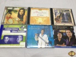 Lote de 6 Cd's originais. Títulos nacionais composto por : Sandy e Junior , Roberto Carlos, Caetano Veloso, etc.