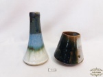 2 vasos em ceramica vitrificada  artesanal. O maior medindo 15cm o maior e 8cm o menor.