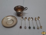 Lote composto de xícara de café em prata 90 e 6 colheres em prata 90 cabo torcido com pedra.