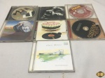 Lote de 7 cd's originais, composto de títulos nacionais e internacionais tais como LEGIÃO URBANA, THE ROLLING STONES, PAUL MCCARTNEY, etc.