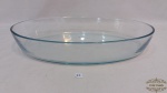 Travessa oval em vidro pirex translucido.Medidas: 39cm de comprimento e 26cm de largura.