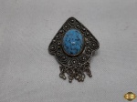 Broche com argola para pingente em prata de lei, com linda pedra azul turquesa. Medindo : 4 CM.