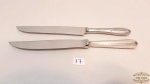 2 facas trinchantes em  aço inox Eberle, e Prata 90 Wolff.Medidas: 27 cm comprimento.