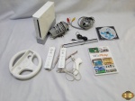 Console Nintendo Wii, modelo RVL-001, com acessórios e 2 jogos. Produto não testado.
