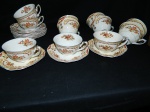 Antigo conjunto de porcelana insglesa ALFRED MEAKIN  decoração floral com 11 xícaras  , 11 pires medindo 11 x 5 cm e diâmetro 15 cm