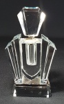 ART DECO, anos 30 - Perfumeiro em bloco único de cristal com altíssimo brilho. Possui bastão aplicador.  Borda em metal prateado. Med. 14 x 08 cm.