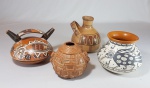 Lote com 4 réplicas de cerâmicas pre colombianas. Medida da mais alta: 14 cm.