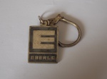 ANTIGO CHAVEIRO EM METAL PRATEADO DA " EBERLE " 70 ANOS ( 1896 - 1966 )