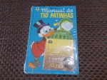 BRASIL - ANTIGO MANUAL DO TIO PATINHAS, CONTENDO A LENDÁRIA MOEDA NÚMERO 1 LEMBRANDO QUE ESTE FASCÍCULO ESTA LACRADO E É A 3a. EDIÇÃO JÁ LANÇADA, SENDO UMA REEDIÇÃO DO ANO DE 2016 E A TITULO DE CURIOSIDADE A PRIMEIRA EDIÇÃO FOI LANÇADO NO ANO DE 1972 ( DISNEY )