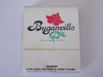 FILUMENIA - ANTIGA CAIXA DE FÓSFOROS DE BOLSO " BUGANVILLE PALACE HOTEL " CONTEM OS PALITOS