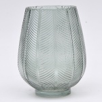 Grande vaso estilo art deco em vidro murano verde decorado com escamas em alto relevo. Diam. 20cm Alt.: 26cm