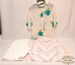 Lote 3 Peças Sendo 2 Camisas e 1 Bermudão . Medidas: blusa de tecido 48, blusa florida 42, bermuda tamanho Médio. Composição: Floral Poliester , Algodão