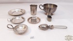 Lote de 8 peças diversas em  metal prateado ,sendo 1 olher coador de cha, 1 caneca , 1 argola