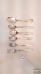 6 talheres  diversos em metal e prata 90 l .Medidas: maior 17,menor 14cm.
