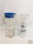 Lote composto de  decanter em vidro e jarra em vidro com tampa em plástico duro. Medindo a jarra ,24cm de altura.