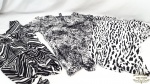 Lote 3 Blusas Femininas Diversas Estampas.Medidas: Blusa Branca e Preta Marca Carmem Tamanho L 95% poliester 5%spandex; Blusa Branca e preta desenhos assimetricos  Tam M 95% poliester 5% elastanosem manga; Blusa brancaPreta e cinza Alfani Tamanho M 95% poliester 5%spandex com manga