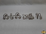 Lote de 6 argolas de guardanapo em aço na forma de letras. Medindo 5cm de diâmetro. Letras: B,E,F,M,N,R.