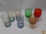 Lote composto de 4 copos longos e 3 taças de vinho em cristal colorido. Medindo a taça 14,5cm de altura.