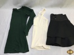 Lote de roupas feminina. Composto por 2 blusas e 1 saia , peças em ótimo estado de conservação. Blusa Verde de manga comprida TAM : MBlusa Branca de alcinha TAM : M Saia Preta TAM: M