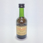 Colecionismo - Mini garrafa de 50 ml lacrada Courvoisier  "Le Cognac de Napoleon". Dimensões: 11 cm x 3,5 cm.