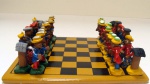 Jogo de xadrez em barro cozido pintado 26x26cm