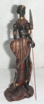 Escultura de Guerreira da Africa do Sul, em material sintético patinado, alt. 19cm