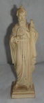 BIANCHI - Escultura em resina representando Santo, possivelmente Santo Antão do Deserto, com base em formato quadrangular. Peça marcada ''Bianchi'' em seu reverso. Medida: 20,5cm de altura
