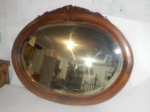 Espelho bisotado com moldura em madeira. (desgastes) med.  70 x55 cm