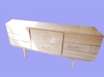 Móvel anos 70 em madeira revestido  com fórmica 02 porta, 02 gavetas  . (desgastes) med.: 70 x1,50 x46 cm.