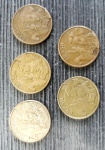 Lote de moedas de 10 centavos de Real Anômalas com excesso de metal (cunho rachado). Contém 5 moedas das seguintes datas 2001, 2002, 2004, 2008 e 2010