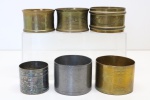 COLECIONISMO - Lote de 6 porta guardanapos de coleção em metal diversos, sendo 2 da famosa manufatura WMF. Maior 4x5 cm e menor 3,5x3,5 cm.