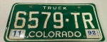 Placa de caminhão americana do estado do Colorado, Estados Unidos. Original de 1992 e último ano de licenciamento 2011. Tem alguns desgastes e amassados conforme foto.