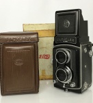 Camera ELMO FLEX Japan Olympus ZUIKO, F.C 1:3,5 , F=7,5cm, em perfeito estado de conservação, acompanha caixa de couro e caixa original de fábrica