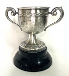COLEÇÃO - trofeu de metal espessurado a prata, Vicente Rizzoli 1960, medindo: 16 cm alt.