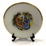 LIMOGES France, miniatura de prato em porcelana, com desenho feito a mão, medindo: 4,5 cm diâmetro.