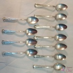 (MBRECHO) 11 Colheres De Cha Em Prata 90 Internacional Silver. Medindo: 11cm de comprimento. Tem gravado no cabo "THE HOMESTEAD"