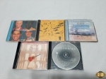 Lote de 5 cds originais, composto de Chico Buarque, Rodstewart, etc.