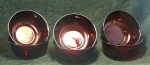 Seis <i>bowls</i>, vidro moldado, tonalidade rubi, manufatura francesa, marcados <B>ARCOROC</b>  nos reversos das bases, <i>design</i> contemporâneo. 5,5x11,9cm. Íntegros.
