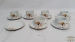 Real-6 xicaras de cha porcelana real decoradas .Medidas: xícara 5 cm de altura e 7 cm de diâmetro , pires 13 cm de diâmetro , 7 pires e 6 xícara ( 1 xícara com um bicado na base ) porcelana Real