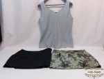 Lote de 3 peças femininas, 2 saias e blusa seda sintetica.Medidas: saias tamanho 42, blusa 44,