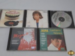 Lote de 5 CD's Originais. Composto por títulos nacionais e internacionais tais como: The Rolling Stones, . Caetano Veloso, Roberto Carlos, etc.