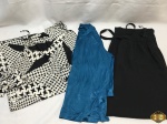 Lote de roupas feminina. Composto por 2 blusas E 1 calça , peças em ótimo estado de conservação. Blusa azul seda importada TAM: M  , Blusa preto e branco TAM: G e calça preta TAM: M