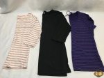 Lote de Roupas feminina. Comporto por 1 Blusa listrada rosa TAM: P, Blusa listrada roxa TAM: 42 e uma preta de manga comprida TAM:42.