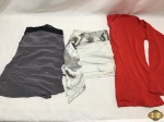 Lote de roupas feminina. Composto por 1 blusa, 1 short e 1 casaco  , peças em ótimo estado de conservação. Casaco vermelho TAM : P, Blusa de alcinha TAM: G e short TAM: 44.