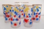 Lindo conjunto anos 70, composto por seis copos e um balde de gelo ricamente decorados com pinturas de estrelas e com bordas douradas.