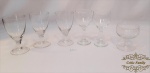 6 taças  variadas em cristal e vidro. meddia maior 13,5 altura e menor 9 cm de altura
