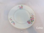 Vista Alegre-Prato decorativo  em porcelana ,decorado com flores, MEDIDA 23 CM DE DIAMETRO,  pequeno bicado na parte de traz., imperceptivel