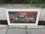 Quadro com óleo sobre eucatex, moldura em madeira. Medindo a moldura 76,5cm x 43cm.